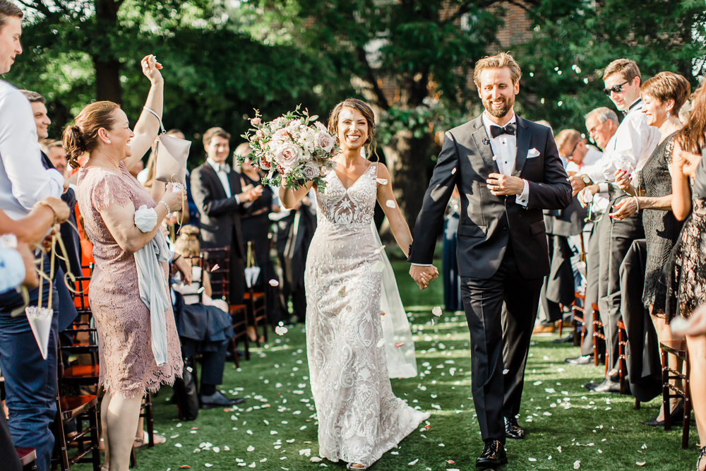 Couple walking down the aisle at a wedding