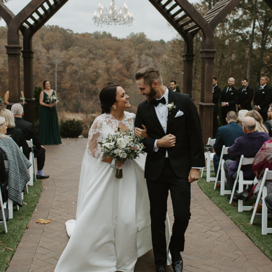 Couple walking down the aisle at a wedding